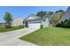 Well-maintained home with a two-car garage and a manicured front lawn at 2914 Glenarden Dr, Charleston, SC 29414