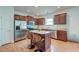 Updated kitchen showcases stainless steel appliances, a large island, and ample counter space at 2914 Glenarden Dr, Charleston, SC 29414