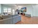 Bright living room with hardwood floors, neutral tones, and a large sectional sofa at 2914 Glenarden Dr, Charleston, SC 29414