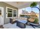 Cozy screened patio with comfortable seating and a hanging chair, perfect for outdoor relaxation at 2914 Glenarden Dr, Charleston, SC 29414
