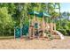 Community playground equipment with slides, climbing structure, and mulch ground cover at 2914 Glenarden Dr, Charleston, SC 29414