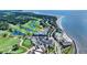 Expansive aerial shot of 293 Atrium Villa highlighting golf course, community pool, and beach access at 2933 Atrium Villa Dr # 33, Seabrook Island, SC 29455