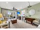 Inviting living room with comfortable seating and balcony access for scenic views at 2933 Atrium Villa Dr # 33, Seabrook Island, SC 29455