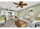Comfortable living room featuring a cozy sofa, wooden furniture, and coastal decor at 2933 Atrium Villa Dr # 33, Seabrook Island, SC 29455