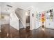 Hallway with staircase, bench, built in shelves, and view to front door at 301 Dunlin Dr, Summerville, SC 29486