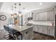 Beautiful kitchen with a large center island, granite countertops, and stainless steel appliances at 301 Dunlin Dr, Summerville, SC 29486