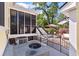 View of a cozy backyard with a screened in porch and air conditioning unit at 3023 Macbeth Creek Dr, Charleston, SC 29414