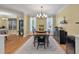 Charming dining area with hardwood floors, area rug, chandelier, and a table with seating at 3023 Macbeth Creek Dr, Charleston, SC 29414