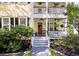 Inviting front entrance with a charming porch, decorative plants, and a clear view of the house number at 3023 Macbeth Creek Dr, Charleston, SC 29414