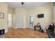 This home gym/office has a ceiling fan, a door to the outside and contains various weights at 3023 Macbeth Creek Dr, Charleston, SC 29414
