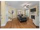 Bright living room with hardwood floors, a fireplace, and seamless transition to other living spaces at 3023 Macbeth Creek Dr, Charleston, SC 29414