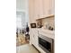 Kitchen with stainless steel microwave and adjacent dining area at 3025 Dewitt Ct, Hollywood, SC 29449