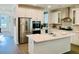 Well-equipped kitchen features stainless appliances, sleek white cabinets, and ample lighting at 3025 Dewitt Ct, Hollywood, SC 29449
