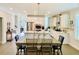 Well-lit kitchen with stainless appliances, an island, ample counter space, and hardwood floors at 3025 Dewitt Ct, Hollywood, SC 29449