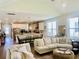 Open concept floor plan that integrates the kitchen, dining, and living areas for social gatherings at 3025 Dewitt Ct, Hollywood, SC 29449