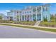 Charming townhomes boast double porches, inviting curb appeal, and classic architectural details at 3119 Sturbridge Rd, Mount Pleasant, SC 29466