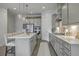 Beautiful kitchen featuring gray cabinets, center island with seating, and updated appliances at 3119 Sturbridge Rd, Mount Pleasant, SC 29466