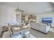 Open concept living space seamlessly connects the dining area, kitchen, and living room at 3119 Sturbridge Rd, Mount Pleasant, SC 29466