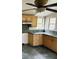 Kitchen showcasing a fan, lots of light, plenty of counterspace and ample cabinets at 334 E Poplar Branch Dr, Moncks Corner, SC 29461