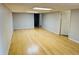 Bright living room with hardwood flooring and recessed lights at 334 E Poplar Branch Dr, Moncks Corner, SC 29461