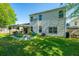 Spacious backyard with a patio, outdoor seating, and a well-maintained lawn at 3363 Kinross Ct, Summerville, SC 29485