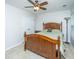 A bedroom featuring a wooden bed frame, a neutral carpet, and a window with blinds for natural light at 3363 Kinross Ct, Summerville, SC 29485