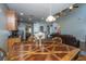 Dining table with seating, next to kitchen and living room at 3363 Kinross Ct, Summerville, SC 29485