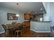 Dining space adjacent to the kitchen features hardwood floors at 3363 Kinross Ct, Summerville, SC 29485