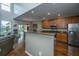 Well-lit kitchen featuring granite countertops, stainless steel appliances, and hardwood flooring at 3363 Kinross Ct, Summerville, SC 29485