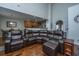 Open concept living area showcasing hardwood floors, high ceilings, and seamless flow to the kitchen at 3363 Kinross Ct, Summerville, SC 29485