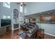 Spacious living room with high ceilings, a fireplace, and an open layout with hardwood flooring at 3363 Kinross Ct, Summerville, SC 29485
