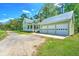 Charming home with a metal roof and a three-car garage at 345 Mentor Rd, Summerville, SC 29483