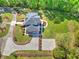 Expansive property with long driveway, lush greenery, and a basketball court at 349 Mentor Rd, Summerville, SC 29483