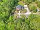 Stunning aerial view of a luxury home with a long driveway and mature landscaping at 349 Mentor Rd, Summerville, SC 29483
