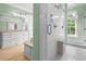 Bathroom featuring a shower and white tiling at 349 Mentor Rd, Summerville, SC 29483