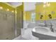 Bathroom featuring a soaking tub, glass enclosed shower and double sink vanity at 349 Mentor Rd, Summerville, SC 29483