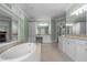 Spacious bathroom with double vanities, cabinetry and soaking tub at 349 Mentor Rd, Summerville, SC 29483
