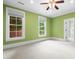 Spacious bedroom featuring two windows and neutral carpeting at 349 Mentor Rd, Summerville, SC 29483