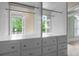 Closet with built in shelving and windows that overlook the outdoor landscape at 349 Mentor Rd, Summerville, SC 29483