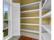 This spacious walk-in closet features ample shelving and natural light, making organization a breeze at 349 Mentor Rd, Summerville, SC 29483