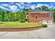 Brick house with an attached garage, and lush green lawn at 349 Mentor Rd, Summerville, SC 29483