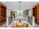 Staircase with ornate chandelier leading to open foyer and living spaces with an airy design at 349 Mentor Rd, Summerville, SC 29483
