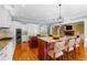 Spacious kitchen featuring double islands, granite countertops, stainless steel appliances, and seating for casual dining at 349 Mentor Rd, Summerville, SC 29483