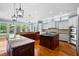 Bright kitchen showcasing double islands, granite countertops, stainless steel appliances, and ample counter space at 349 Mentor Rd, Summerville, SC 29483