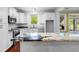 Well-equipped kitchen with granite countertops, stainless appliances, and ample cabinet space at 349 Mentor Rd, Summerville, SC 29483