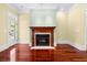 Living room featuring a wood burning fireplace and hardwood flooring at 349 Mentor Rd, Summerville, SC 29483