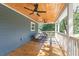 Inviting back porch features a wood ceiling, comfortable seating, and a ceiling fan at 3683 Hilton Dr, Johns Island, SC 29455