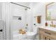 Bathroom with a modern bathtub, stylish vanity, and a black and white shower curtain at 3683 Hilton Dr, Johns Island, SC 29455