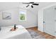 Inviting bedroom with modern décor, featuring a pitched ceiling and tranquil view at 3683 Hilton Dr, Johns Island, SC 29455