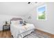 Bright bedroom boasts a comfortable bed with plush pillows and ample natural light at 3683 Hilton Dr, Johns Island, SC 29455